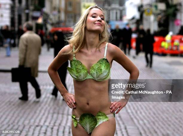 Miss United Kingdom Brooke Johnston, wearing a lettuce leaf bikini to unveil PETA's new 'Turn Over a New Leaf:Try Vegetarian' campaign, at Covent...