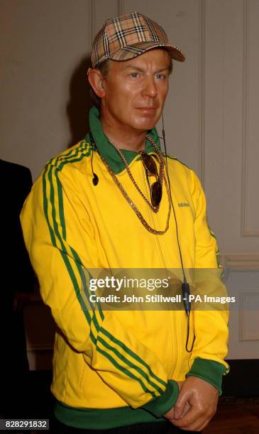 Madame Tussauds give British Prime Minister Tony Blair's wax figure a "chav" makeover, dressing him in tracksuit, trainers, gold bling and...