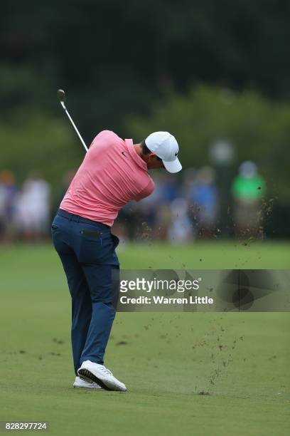 Rory McIlroy of Northern Ireland plays his second shot on the fifth hole during a practice round prior to the 2017 PGA Championship at Quail Hollow...