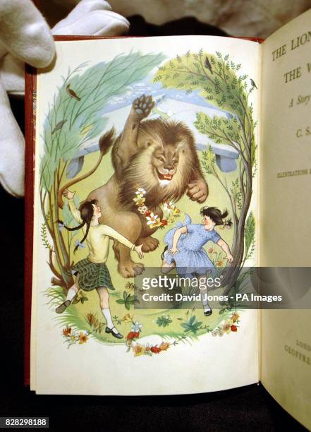 The title page illustration unique to the first edition Narnia books and part of a bound set of first editions by C S Lewis at the National Fine Arts...