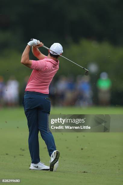 Rory McIlroy of Northern Ireland plays his second shot on the fifth hole during a practice round prior to the 2017 PGA Championship at Quail Hollow...