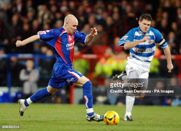 Crystal Palace's Andrew Johnson takes the ball past Reading's Graeme Murty during the Coca-Cola Championship match at Selhurst Park, London, Friday...
