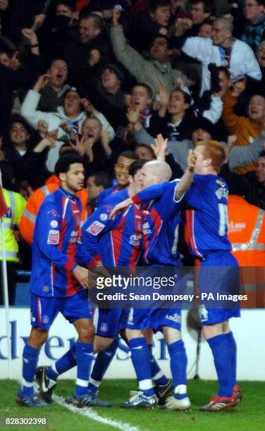 Crystal Palace's Andrew Johnson celebrates with team-mates after scoring from a penalty against Reading during the Coca-Cola Championship match at...