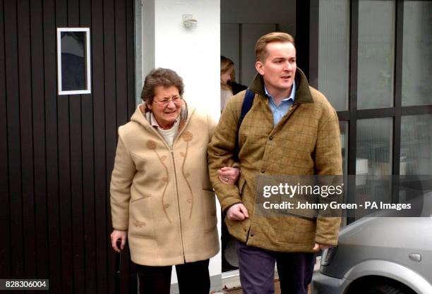Dr Anne Turner is helped by her son Edward from the Dignitas clinic in Forch, Switzerland, Tuesday January 24, 2006. In the summer of 2004, the...
