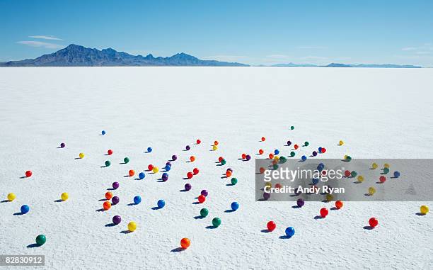 multi-colored balls on salt flats - saltäng bildbanksfoton och bilder