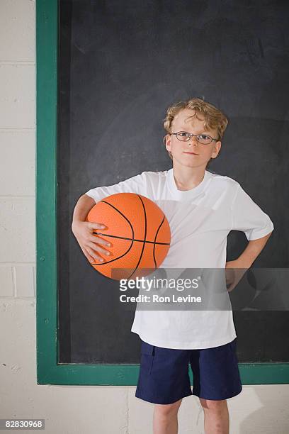 boy carrying basketbal - blackboard qc stock pictures, royalty-free photos & images