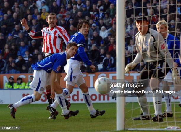 Southampton's Danny Higginbottom and Leicester City's Joey Gudjonsson Patrick McCarthy and Rab Douglas watch a Southampton shot go wide during the FA...