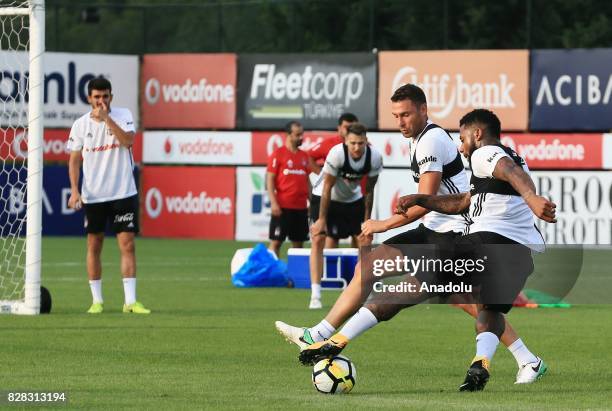 Jeremain Lens and Dusko Tosic of Besiktas attend a training session ahead of the Turkish Spor Toto Super Lig new season match between Besiktas and...