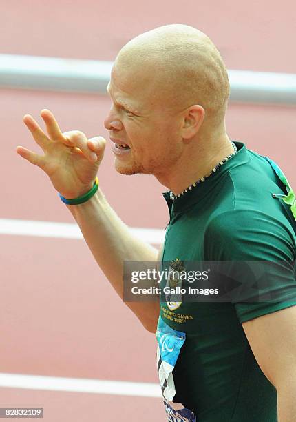 Hilton Langenhoven of South Africa celebrates winning the Men's 200m T12 at the National Stadium during day 10 of the 2008 Paralympic Games on...