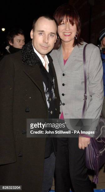 David Furnish and Janet Street-Porter arrive for designer Philip Treacy's London Fashion Week Autumn/Winter 2006 show, in collaboration with Umbro,...