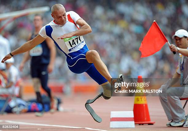 Xavier le Draollec of France is red flagged for the third time and disqualified from the final of the men's long jump F42-44 classification event at...