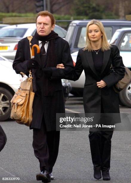 Mike McCartney, brother of former Beatle Paul, arrives with wife Rowena at Chester Crown Court, Wednesday February 22 where is charged with sexual...