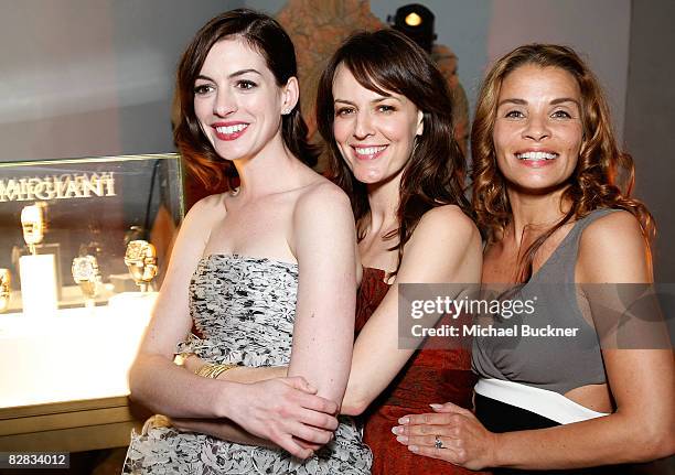Actress Anne Hathaway, actress Rosemarie DeWitt and writer Jenny Lumet attend the after party hosted by Parmigiani for the Los Angeles premiere of...