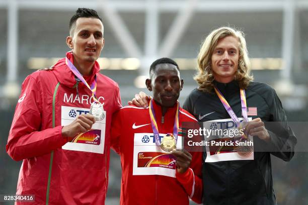 Soufiane Elbakkali of Morocco, silver, Conseslus Kipruto of Kenya, gold, and Evan Jager of the United States, bronze, pose with their medals for the...