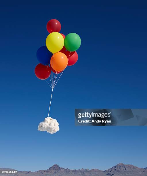 ballons carrying cloud across sky - balloons in sky stock pictures, royalty-free photos & images