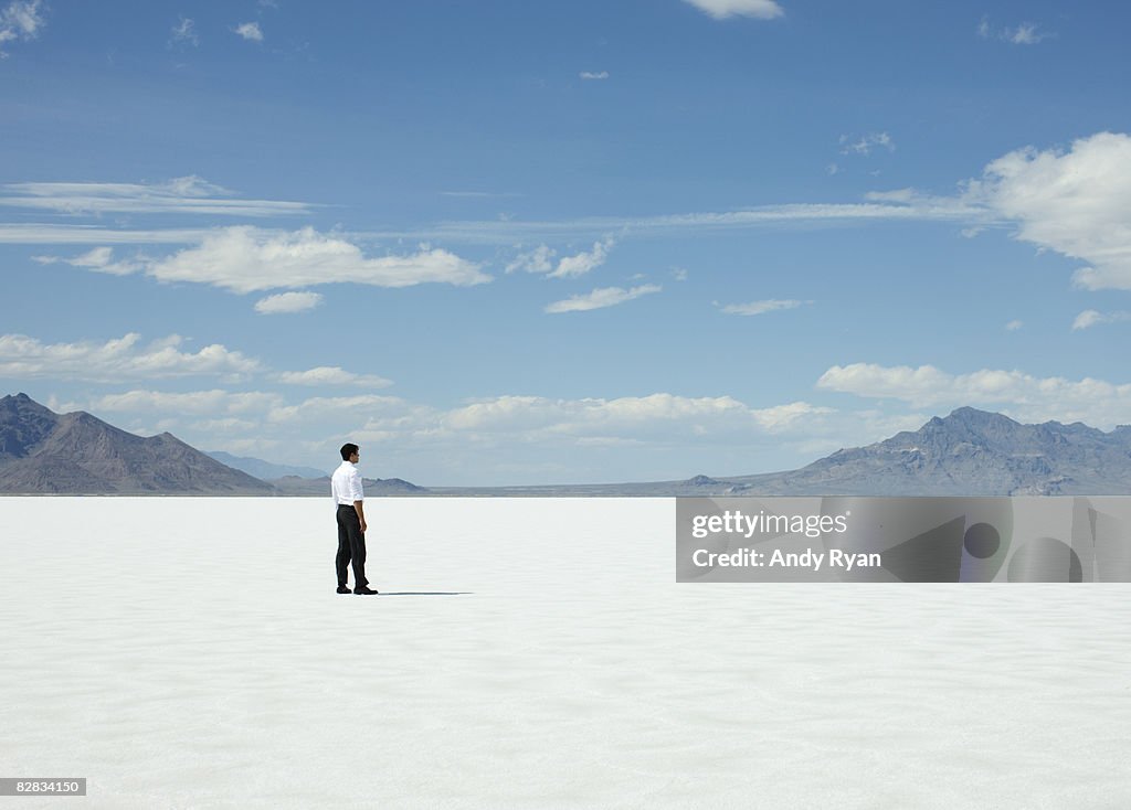 Man Standing Alone on Salt Flats.