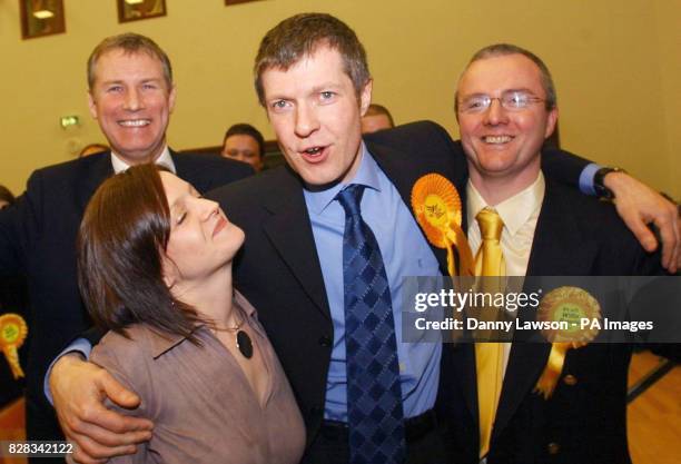 Willie Rennie Scottish Liberal Democrats candidate celebrates his shock win with wife Jannet , Nicol Stephen and Peter Barrett in the Dunfermline and...