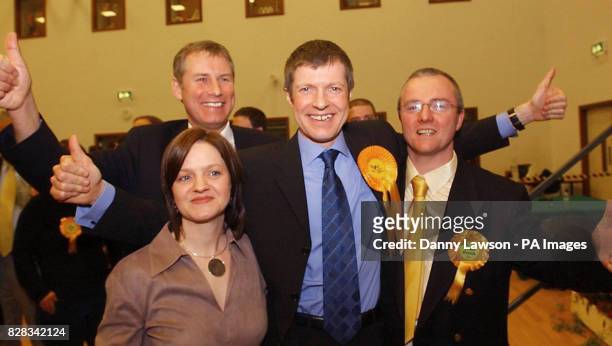 Willie Rennie Scottish Liberal Democrats candidate celebrates his shock win with wife Janet Nicol Stephen and Peter Barrett in the Dunfermline and...