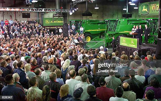 President George W. Bush speaks to employees of the John Deere Harvester Works January 14, 2002 in East Moline, Illonois. Bush spoke to employees and...