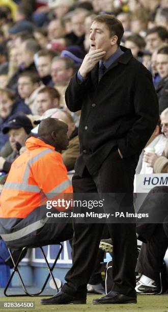 Millwall's manager David Tuttle watches his team play against Wolverhampton Wanderers during their Coca-Cola Championship football match at...