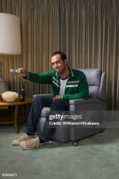 Man Using Remote Control 15,866 Man Using Tv Remote Control Stock Photos, High-Res Pictures, and ...