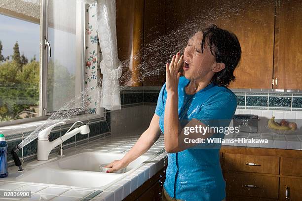 Water Getting Sprayed Kitchen Sink Spray Photos and Premium High Res Pictures - Getty Images