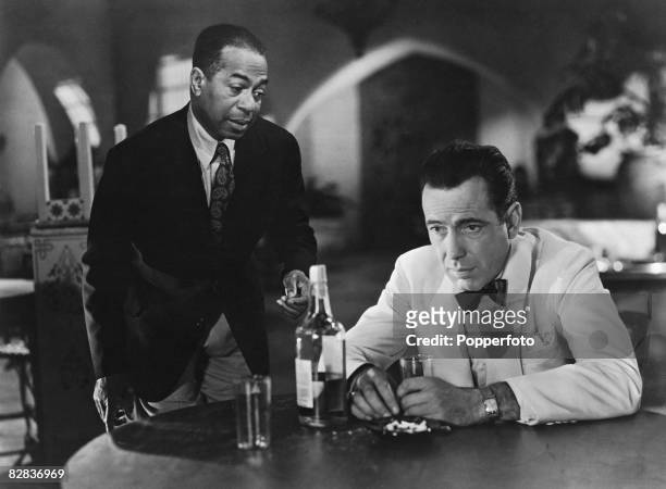Humphrey Bogart and Dooley Wilson star in the Warner Brothers film 'Casablanca', 1942.