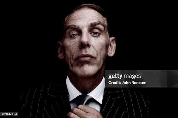 studio portrait of man in suit - authority bildbanksfoton och bilder