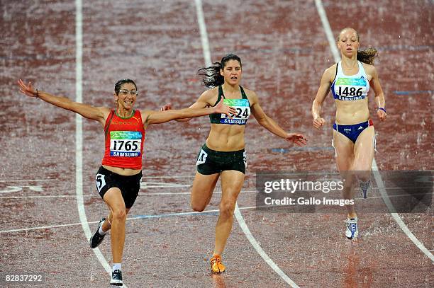 Sanaa Benhama of Marocco wins Gold, followed by Ilse Hayes of South Africa coming second, in the 100m T13 during day 10 of the 2008 Beijing...