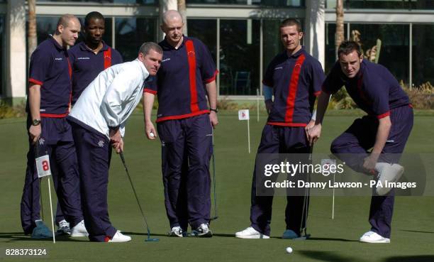 Rangers players Alex Rae, Marvin Andrews, coach Ian Durrant, Dr Ian McGuinnes, Barry Ferguson and Kris Boyd on the putting green of the La Calderona...