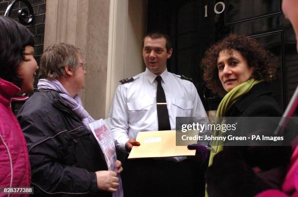 Maya Evans, Liz Khan and Maysoon Pachachi mark International Women's Day by presenting a petition to No 10 Downing Street in central London,...