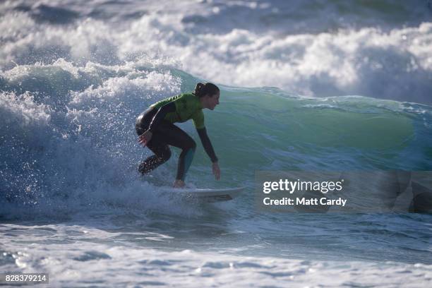 Joanne Dennison competes in a heat of the Boardmasters Roxy Open at the annual Boardmasters festival held on Fistral beach in Newquay on August 9,...