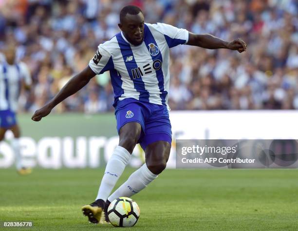 Porto's Malian forward Moussa Marega shoots to score the opening goal during the Portuguese league football match FC Porto vs Estoril Praia at Dragao...