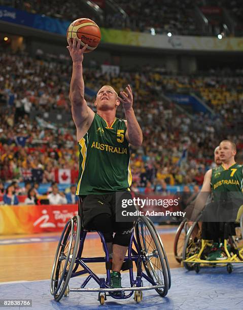 Troy Sachs of Australia shoots during the Gold Medal Wheelchair Basketball match between Australia and Canada at the National Indoor Stadium during...