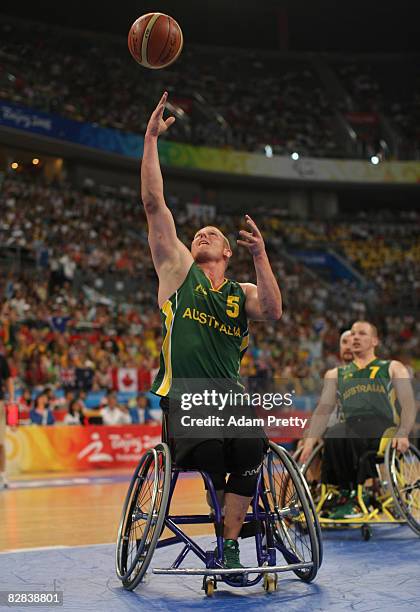 Troy Sachs of Australia shoots during the Gold Medal Wheelchair Basketball match between Australia and Canada at the National Indoor Stadium during...