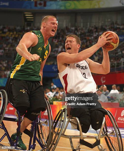 Troy Sachs of Australia collides with Patrick Anderson of Canada during the Gold Medal Wheelchair Basketball match between Australia and Canada at...