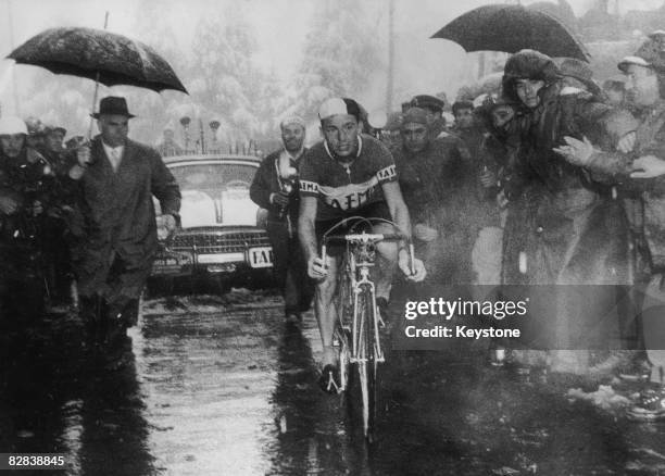 Luxembourgian cyclist Charly Gaul wins the Dolomites stage of the Giro d'Italia from Merano to Monte Bondone, near Trento, 11th June 1956. Gaul...