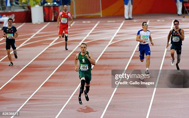 Oscar Pistorius of South Africa wins Gold with a World Record in the 400m T44 during day 10 of the 2008 Beijing Paralympic Games held in Beijing,...