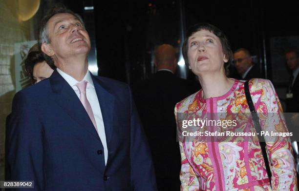 Britain's Prime Minister wife Tony Blair is greeted by his New Zealand counterpart Helen Clark at the Town Hall in Auckland, Tuesday March 28 2006,...