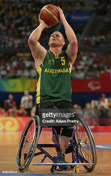 Troy Sachs of Australia shoots during the Gold Medal Wheelchair Basketball match between Australia and Canada at the National Indoor Stadium during...