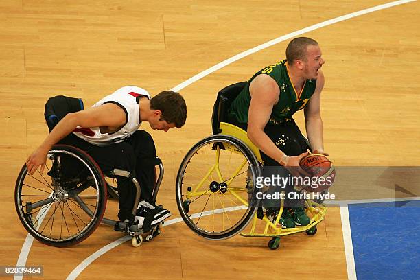 Shaun Norris of Australia looks to pass during the Gold Medal Wheelchair Basketball match between Australia and Canada at the National Indoor Stadium...