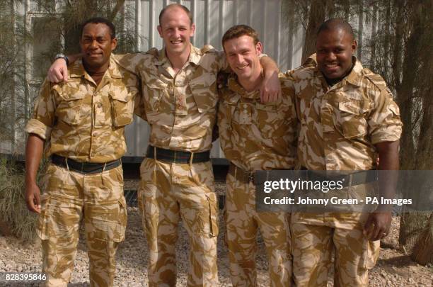 Members of the 1st Battalion Royal Scots triumphant rugby union team including team-captain, Captain Rob Muir , from Edinburgh, Captain Kevin...