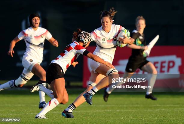 Lenaig Corson of France is tackled by Makiko Tomita of Japan during the Women's Rugby World Cup 2017 match between France and Japan on August 9, 2017...