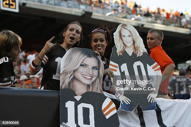 Cleveland Browns fans display cardboard images of Jessica Simpson and Carrie Underwood in an attempt to distract Tony Romo of the Dallas Cowboys...