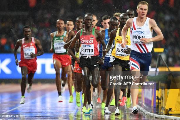 Kenya's Cyrus Rutto, Uganda's Stephen Kissa and Norway's Sondre Nordstad Moen compete in the men's 5000m athletics event at the 2017 IAAF World...