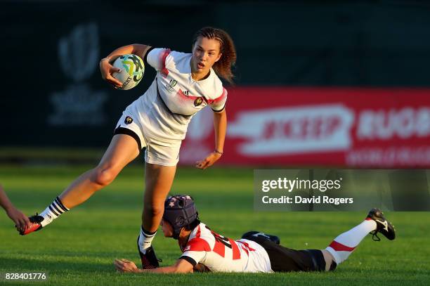 Caroline Drouin of France is tackled by Minori Yamamoto of Japan during the Women's Rugby World Cup 2017 match between France and Japan on August 9,...