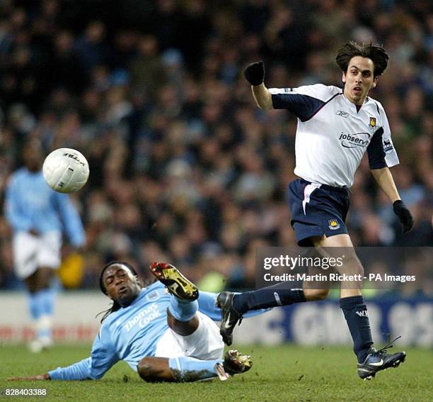 West Ham United's Yossi Benayoun in action against Manchester City's Kiki Musampa during the FA Cup sixth round match at the City of Manchester...