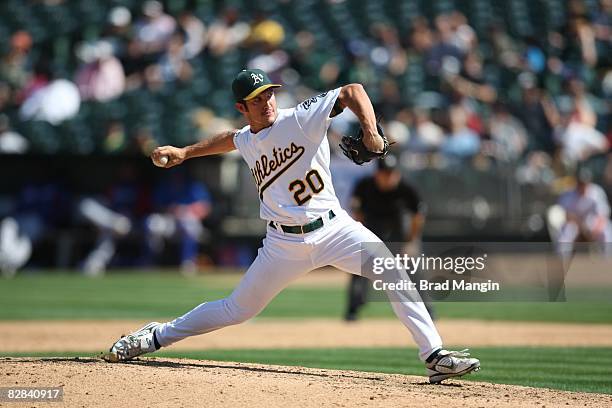 Huston Street of the Oakland Athletics pitches during the game against the Texas Rangers at the McAfee Coliseum in Oakland, California on September...