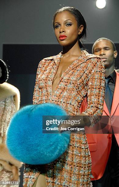 Model walks the runway at the Film Meets Fashion party on the closing night of the 2008 Urbanworld Film Festival at Espace on September 13, 2008 in...