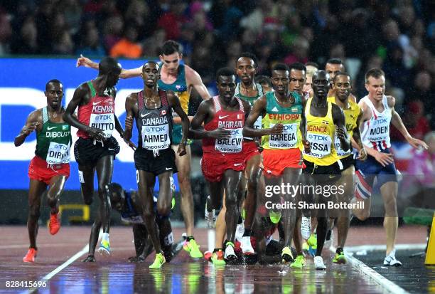 Paul Kipkemoi Chelimo of the United States falls as Cyrus Rutto of Kenya, Mohammed Ahmed of Canada, Birhanu Balew of Bahrain and Selemon Barega of...